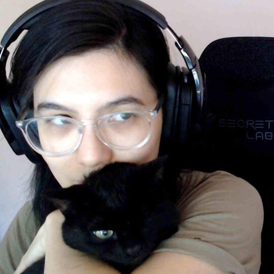 Image of Dana and her one-eyed cat.